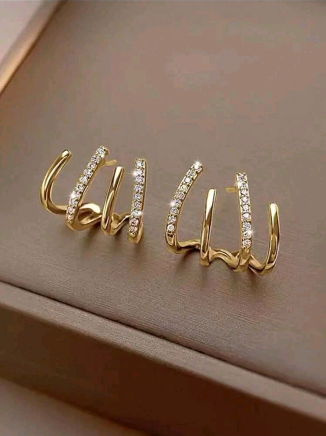 Aretes de garra triple argollas