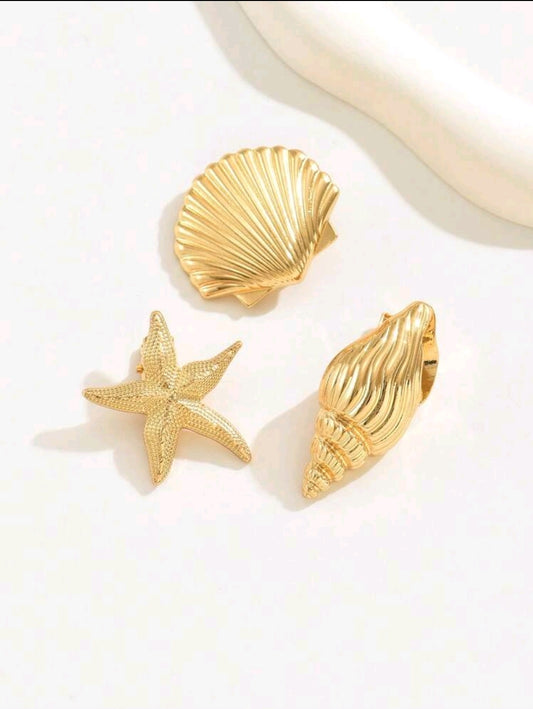 Set de 3 horquillas doradas para el cabello diseño marino