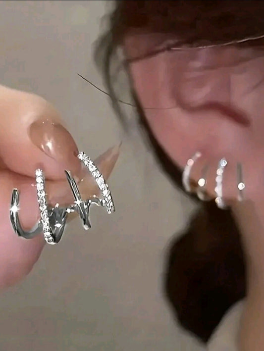 Aretes de garra triple argollas